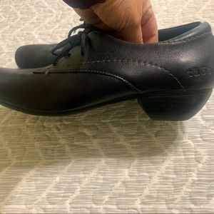 Taos Tie shoes. Worn nicely with slacks or jeans. Very comfortable.